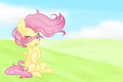 Size: 1200x800 | Tagged: safe, artist:distractedsketching, artist:theluckyangel, derpibooru import, fluttershy, pegasus, pony, blushing, cute, female, folded wings, hooves to the chest, mare, one eye closed, open mouth, outdoors, shyabetes, sitting, solo, stray strand, three quarter view, windswept mane, wings