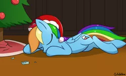 Size: 2500x1495 | Tagged: safe, artist:infrayellow, derpibooru import, rainbow dash, pegasus, pony, christmas, christmas tree, cute, dashabetes, eyes closed, hat, holiday, nap, prone, santa hat, sleeping, solo, tree