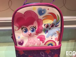 Size: 1600x1200 | Tagged: safe, derpibooru import, pinkie pie, rainbow dash, earth pony, pegasus, pony, my little pony: pony life, backpack, cute, duo, female, flower, flying, heart, irl, looking at you, mare, nyc toy fair 2020, open mouth, photo, picture, rainbow, sparkles, wings