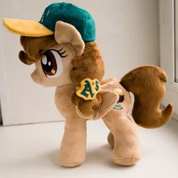 Size: 2200x2200 | Tagged: safe, artist:valmiiki, derpibooru import, oc, oc:vanilla creame, unofficial characters only, pegasus, pony, alcohol, baseball cap, beer, cap, cute, female, folded wings, hat, irl, mare, oakland athletics, photo, plushie, shadow, side view, simple background, solo, wings