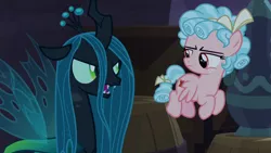 Size: 1920x1080 | Tagged: safe, derpibooru import, screencap, cozy glow, queen chrysalis, changeling, changeling queen, pegasus, pony, the summer sun setback, barrel, cozy glow is not amused, duo, female, filly, flying, foal, queen chrysalis is not amused, unamused
