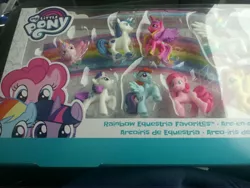 Size: 4160x3120 | Tagged: safe, derpibooru import, fluttershy, pinkie pie, princess cadance, princess celestia, princess flurry heart, rainbow dash, rarity, shining armor, twilight sparkle, alicorn, earth pony, pegasus, pony, unicorn, baby, box, female, husband and wife, irl, looking at you, male, photo, rainbow, raised hoof, rearing, spread wings, toy, walmart, wings