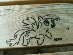 Size: 4618x3464 | Tagged: artist:porschepegasus, derpibooru import, derpy hooves, flying, irl, lineart, marker, marker drawing, photo, safe, spread wings, traditional art, vandalism, wings, wood