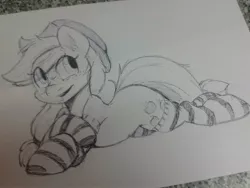 Size: 1024x768 | Tagged: artist needed, source needed, safe, derpibooru import, applejack, earth pony, pony, clothes, female, freckles, hat, irl, mare, photo, prone, socks, solo, striped socks, traditional art