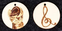 Size: 1014x507 | Tagged: artist:malte279, craft, cutie mark, derpibooru import, jewelry, octavia melody, pendant, pyrography, safe, traditional art, wood