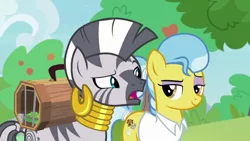 Size: 1920x1080 | Tagged: safe, derpibooru import, screencap, doctor fauna, zecora, earth pony, pony, zebra, she talks to angel, cage, duo, duo female, ear piercing, earring, eyeshadow, female, grin, jewelry, lidded eyes, looking at each other, makeup, mare, neck rings, open mouth, piercing, ponytail, purple eyeshadow, raised eyebrow, smiling, smirk, tree