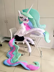 Size: 768x1024 | Tagged: safe, artist:nekokevin, derpibooru import, princess celestia, alicorn, pony, chair, clothes, female, glasses, irl, lidded eyes, mare, photo, plushie, shirt, sitting, skirt, smiling, solo