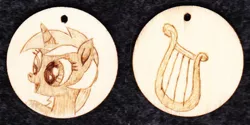 Size: 1000x500 | Tagged: artist:malte279, craft, cutie mark, derpibooru import, index get, jewelry, lyra heartstrings, palindrome get, pendant, pyrography, safe, traditional art, wood