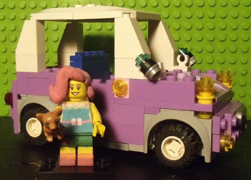 Size: 1024x735 | Tagged: safe, artist:grapefruitface1, derpibooru import, fluttershy, dog, driving miss shimmer, equestria girls, equestria girls series, animal, car, custom, driving miss shimmer: fluttershy, irl, lego, minifig, photo, puppy, solo focus, toy