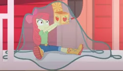 Size: 1482x857 | Tagged: safe, derpibooru import, screencap, apple bloom, equestria girls, equestria girls series, holidays unwrapped, spoiler:eqg series (season 2), adorabloom, apple bloom's bow, boots, bow, box, caught, clothes, cropped, cute, hair bow, house, jack in the box, jack-in-the-box, jeans, lifting, net, pants, shirt, shoes, sitting, solo, surprised, the cider louse fools