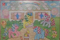 Size: 616x410 | Tagged: bird, bow, candy, candy cane, candy cane pony, caramel crunch, derpibooru import, duck, food, g1, gingerbread man, house, ice cream cone, lemon treats, lollipop, milton bradley, mint dreams, molasses, official, photographer:wickedwonderland, puzzle, safe, tail bow