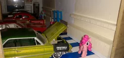 Size: 3264x1546 | Tagged: safe, artist:perpetualfanboy, derpibooru import, apple bloom, pinkie pie, rainbow dash, earth pony, pegasus, blind bag, car, chevrolet impala, door, everfree customs, ford crown victoria police interceptor, garage, pontiac gto, shelf, sink, toolbox, toy, volkswagen beetle, window, workbench