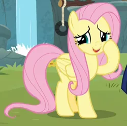 Size: 381x378 | Tagged: safe, derpibooru import, screencap, fluttershy, pegasus, pony, memnagerie, spoiler:memnagerie, spoiler:mlp friendship is forever, cropped, cute, female, folded wings, hoof on cheek, looking to side, mare, raised hoof, shyabetes, smiling, solo, talking, waterfall, wings