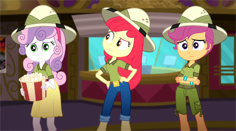 Size: 2648x1475 | Tagged: safe, derpibooru import, screencap, apple bloom, scootaloo, sweetie belle, eqg summertime shorts, equestria girls, the canterlot movie club, belt, boots, clothes, crossed arms, cutie mark crusaders, food, hand on hip, hat, jeans, looking at someone, looking at something, pants, popcorn, sad, shoes, shorts, skirt, theater