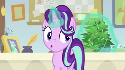 Size: 1920x1080 | Tagged: safe, derpibooru import, screencap, phyllis, starlight glimmer, pony, unicorn, a horse shoe-in, female, inkwell, magic, magic aura, mare, philodendron, potted plant, quill, solo, starlight's office, telekinesis