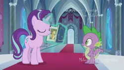 Size: 1280x720 | Tagged: safe, derpibooru import, screencap, spike, starlight glimmer, dragon, pony, unicorn, memories and more, spoiler:memories and more, spoiler:mlp friendship is forever, 9now, book, eyes closed, levitation, magic, magic aura, scrapbook, smiling, telekinesis, winged spike