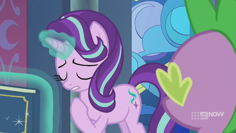 Size: 1280x720 | Tagged: safe, derpibooru import, screencap, spike, starlight glimmer, dragon, pony, unicorn, memories and more, spoiler:memories and more, spoiler:mlp friendship is forever, 9now, book, eyes closed, levitation, magic, magic aura, pointing at self, scrapbook, telekinesis, winged spike