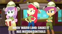 Size: 1280x713 | Tagged: safe, derpibooru import, edit, edited screencap, screencap, apple bloom, scootaloo, sweetie belle, eqg summertime shorts, equestria girls, the canterlot movie club, belt, boots, clothes, crossed arms, cutie mark crusaders, food, hand on hip, hat, jeans, looking at someone, looking at something, nintendo, pants, popcorn, sad, shoes, shorts, skirt, text, theater, wario land, wario land: shake it