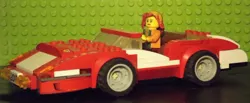 Size: 1024x423 | Tagged: safe, artist:grapefruitface1, derpibooru import, sunset shimmer, equestria girls, car, irl, lego, lego car, minifig, photo, solo, toy