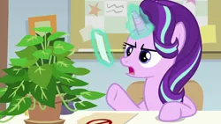 Size: 1920x1080 | Tagged: safe, derpibooru import, screencap, phyllis, starlight glimmer, pony, unicorn, a horse shoe-in, female, magic, magic aura, mare, philodendron, potted plant, solo, telekinesis