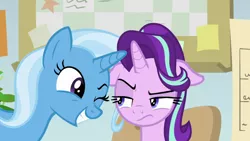 Size: 1920x1080 | Tagged: safe, derpibooru import, screencap, starlight glimmer, trixie, pony, unicorn, a horse shoe-in, annoyed, duo, excited, female, floppy ears, frown, glare, grin, hair flip, mare, narrowed eyes, one eye closed, raised eyebrow, smiling, starlight is not amused, starlight's office, unamused, wink