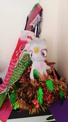 Size: 2240x4032 | Tagged: safe, derpibooru import, photographer:horsesplease, gilda, gryphon, flag, malaysia, photo, plushie, shrine, tinsel