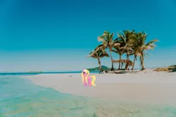 Size: 1920x1280 | Tagged: safe, artist:angello pro, artist:draikjack, derpibooru import, lily, lily valley, earth pony, pony, beach, bedroom eyes, coast, female, flower, flower in hair, honduras, irl, island, lily (flower), mare, photo, ponies in real life, raised hoof, solo, wet, wet mane