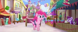 Size: 1920x808 | Tagged: safe, derpibooru import, screencap, mochaccino, pinkie pie, rare find, unnamed character, unnamed pony, earth pony, pony, my little pony: the movie, background pony, balloon, bow, canterlot, canterlot shopkeep, cart, female, friendship festival, hair bow, male, mane bow, mare, market, potted plant, stallion, we got this together, widescreen