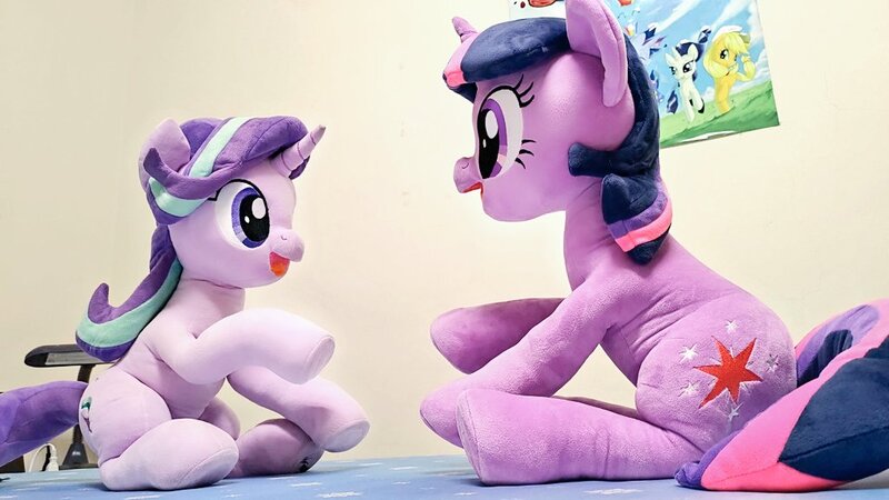 Size: 1024x576 | Tagged: safe, artist:nekokevin, derpibooru import, applejack, rainbow dash, rarity, starlight glimmer, twilight sparkle, pony, unicorn, series:nekokevin's glimmy, duo, duo focus, female, irl, looking at each other, low angle, mare, open mouth, photo, plushie, poster, raised hoof, sitting, smiling, underhoof, unicorn twilight