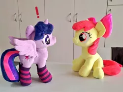 Size: 1024x768 | Tagged: safe, artist:nekokevin, derpibooru import, apple bloom, twilight sparkle, twilight sparkle (alicorn), alicorn, earth pony, pony, 4de, clothes, duo, exclamation point, female, filly, irl, looking at each other, mare, photo, plushie, sitting, smiling, socks, spread wings, starlight's little twibird, striped socks, wings