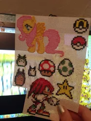 Size: 800x1071 | Tagged: artist:hopperartz, crossover, cross stitch, derpibooru import, egg, fluttershy, irl, knuckles the echidna, my neighbor totoro, photo, pokéball, pokémon, safe, sega, sonic the hedgehog (series), super mario bros., super mushroom, super star, totoro, yoshi egg