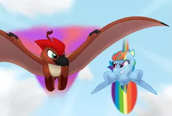 Size: 1197x810 | Tagged: safe, artist:faith-wolff, derpibooru import, rainbow dash, gryphon, pegasus, pony, fanfic:the bridge, crossover, duo, fanfic art, female, flying, godzilla (series), griffonized, kaiju griffon, male, mare, race, rainbow trail, rodan, rodash, species swap, speed trail