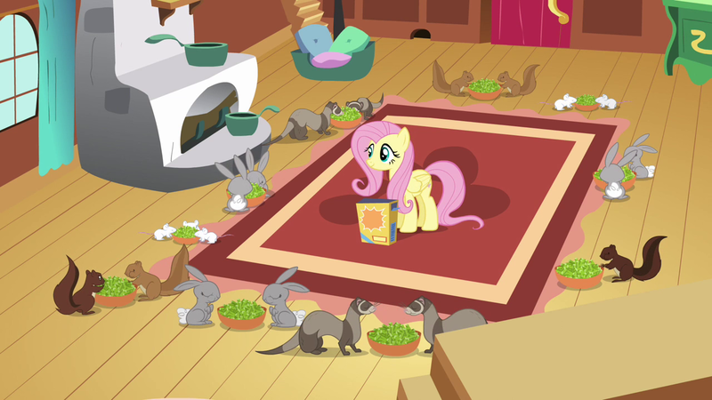 Size: 1280x720 | Tagged: safe, derpibooru import, screencap, angel bunny, fluttershy, ferret, mouse, pegasus, pony, rabbit, rat, rodent, squirrel, putting your hoof down, animal, bowl, celery, critters, eating, female, fluttershy's cottage, fluttershy's cottage (interior), herbivore, inaccurate, mare, rug, smiling, solo