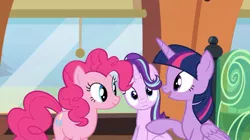 Size: 715x401 | Tagged: safe, derpibooru import, screencap, pinkie pie, starlight glimmer, twilight sparkle, twilight sparkle (alicorn), alicorn, pony, the crystalling, female, mare, train