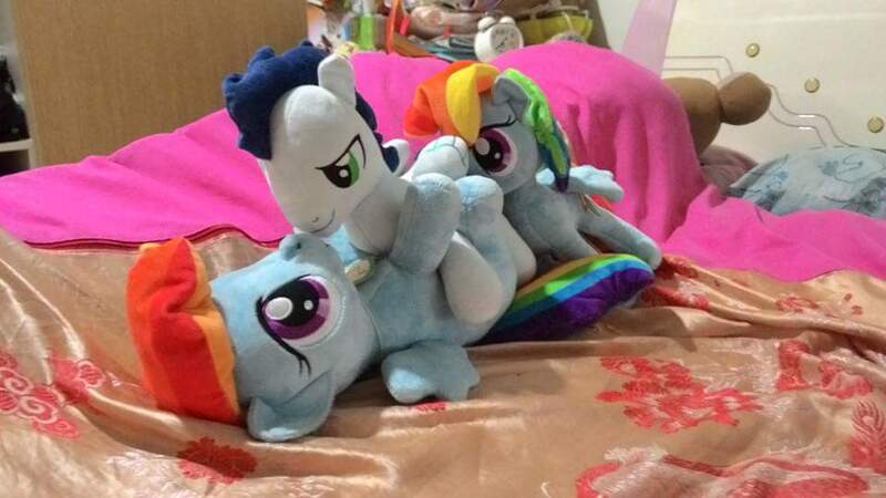 Size: 960x540 | Tagged: questionable, artist:onlyfactory, derpibooru import, rainbow dash, soarin', pony, bootleg, female, group sex, irl, male, merch sexploitation, photo, plushie, self ponidox, sex, shipping, soarindash, straight, threesome