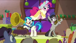 Size: 1280x720 | Tagged: a hearth's warming tail, derpibooru import, discovery family logo, musical instrument, octavia melody, phonograph, pinkie pie, safe, screencap, spirit of hearth's warming presents, victrola scratch, vinyl scratch, violin, wax cylinder