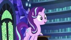 Size: 1920x1080 | Tagged: safe, derpibooru import, screencap, starlight glimmer, pony, unicorn, every little thing she does, female, happy, library, mare, smiling, solo, twilight's castle, twilight's castle library