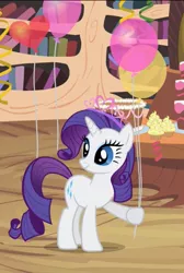 Size: 431x640 | Tagged: safe, derpibooru import, screencap, rarity, pony, unicorn, daring don't, balloon, cake, cropped, cupcake, cute, food, golden oaks library, heart balloon, hoof hold, jewelry, national random holiday party day, party, raribetes, solo, streamers, tiara