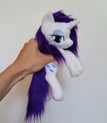 Size: 1510x1725 | Tagged: artist:epicrainbowcrafts, beanie (plushie), derpibooru import, fluffy, hand, irl, lidded eyes, photo, plushie, rarity, safe, solo