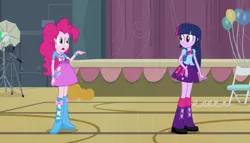 Size: 1904x1090 | Tagged: safe, derpibooru import, screencap, pinkie pie, twilight sparkle, twilight sparkle (alicorn), alicorn, equestria girls, equestria girls (movie), backpack, balloon, boots, bracelet, camera, chair, clothes, implied sci-twi, jewelry, leg warmers, pointing, pumpkin, shoes, skirt