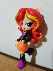 Size: 907x1210 | Tagged: safe, artist:lockerobster, derpibooru import, sunset shimmer, equestria girls, >:), boots, clothes, custom, cute, doll, equestria girls minis, evil grin, grin, high heel boots, irl, jacket, leather jacket, photo, pure unfiltered evil, shimmerbetes, shoes, skirt, smiling, smirk, solo, toy
