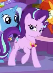 Size: 211x293 | Tagged: safe, derpibooru import, screencap, starlight glimmer, sunburst, trixie, pony, unicorn, celestial advice, equestrian pink heart of courage, horn, jewelry, medal, smiling, twilight's castle