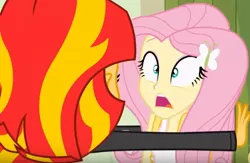 Size: 664x432 | Tagged: safe, derpibooru import, screencap, fluttershy, sunset shimmer, equestria girls, equestria girls (movie), lockers, rear view