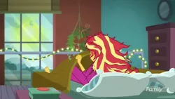 Size: 1024x576 | Tagged: safe, derpibooru import, screencap, sunset shimmer, eqg summertime shorts, equestria girls, monday blues, clothes, fairy lights, pajamas, string lights, sunset's apartment