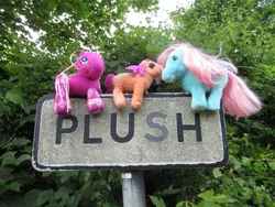 Size: 1800x1350 | Tagged: safe, artist:travelling-my-little-pony, derpibooru import, bowtie (g1), cheerilee (g3), sparkleworks, pony, g1, g3, irl, merchandise, photo, plushie, road sign, sign, straddling, toy