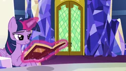 Size: 1280x720 | Tagged: safe, derpibooru import, screencap, twilight sparkle, twilight sparkle (alicorn), alicorn, pony, not asking for trouble, book, magic, prone, reading, solo, telekinesis, twilight's castle