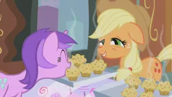 Size: 1280x720 | Tagged: safe, derpibooru import, screencap, amethyst star, applejack, earth pony, pony, unicorn, applebuck season, applejack's hat, bags under eyes, baked bads, cowboy hat, cute, eyes closed, female, floppy ears, food, happy, hat, hate, mare, mouth hold, muffin, orange, purple, smiling, smirk, standing, stetson, this will end in pain, this will end in sickness, tired