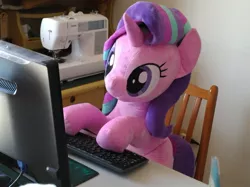 Size: 1199x899 | Tagged: safe, artist:nekokevin, derpibooru import, starlight glimmer, pony, unicorn, series:nekokevin's glimmy, computer, cute, female, glimmerbetes, irl, keyboard, life size, mare, photo, plushie, sewing machine, smiling, solo, vulgar description