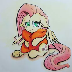 Size: 1080x1080 | Tagged: safe, artist:sketchwhatyousee, derpibooru import, fluttershy, pegasus, pony, cute, floppy ears, frog (hoof), lidded eyes, looking at you, pillow, shyabetes, signature, smiling, solo, spread wings, traditional art, underhoof, wings