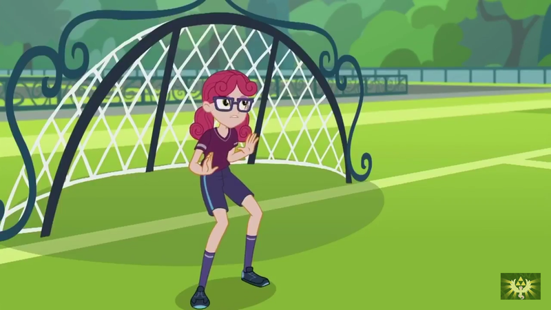 Size: 1280x720 | Tagged: safe, derpibooru import, screencap, alizarin bubblegum, equestria girls, equestria girls series, fluttershy's butterflies, background human, clothes, fluttershy's butterflies: rainbow dash, football, glasses, goal, goalie, shorts, sports